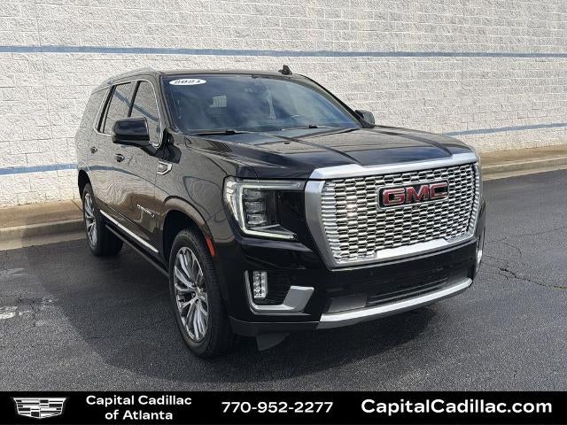 2021 GMC Yukon Denali in Onyx Black — front three-quarter view