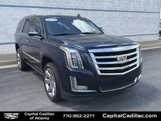 2019 Cadillac Escalade Premium Luxury in Dark Adriatic Blue Metallic — front three-quarter view