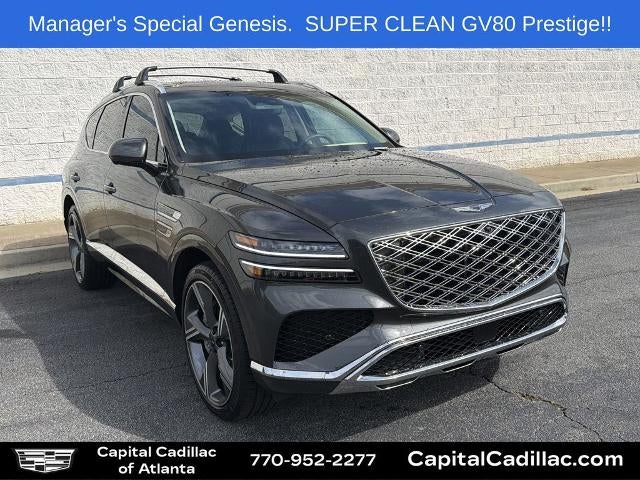 2025 Genesis GV80 3.5T Prestige in Gray — front three-quarter view