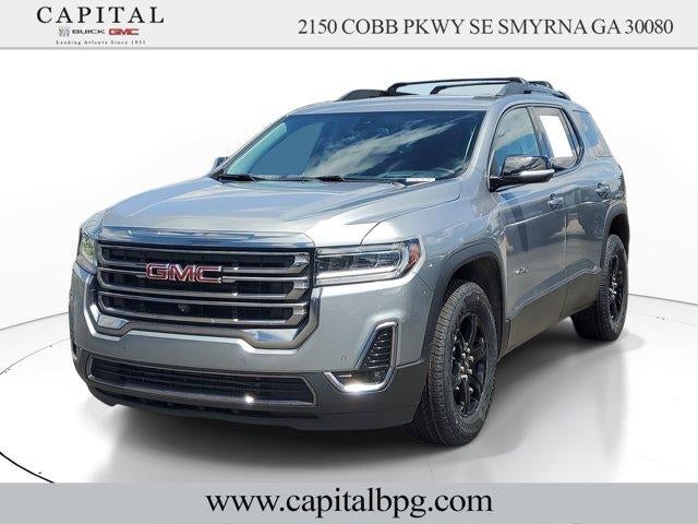 2023 GMC Acadia AT4 in Sterling Metallic — front three-quarter view